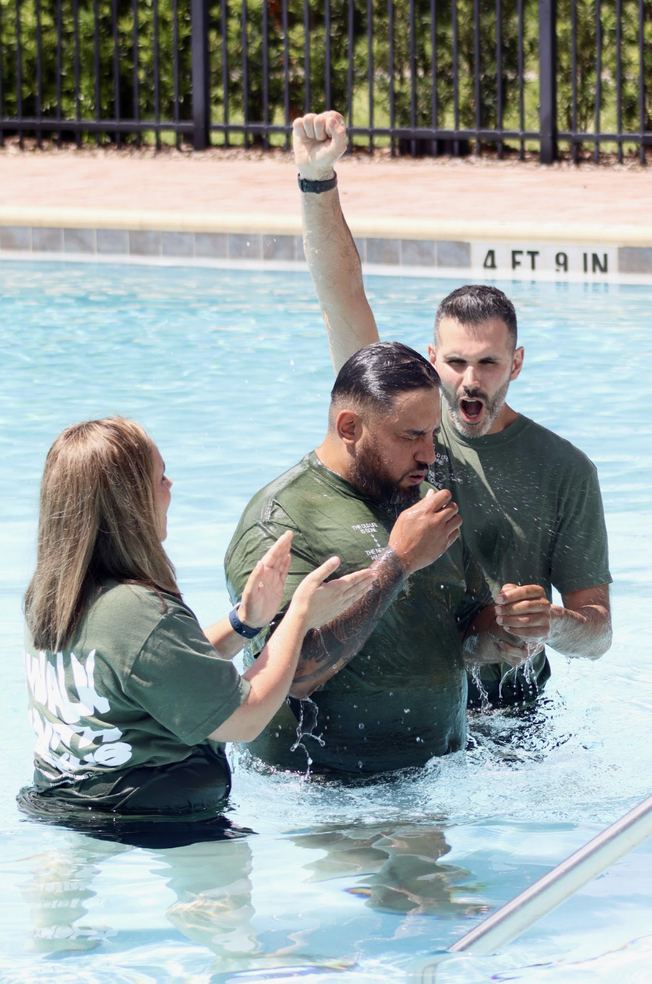 A joyful baptism celebration in the water